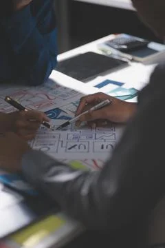 Team of Program Developer Collaborating on UXUI Design Planning in a Modern.. Stock Photos