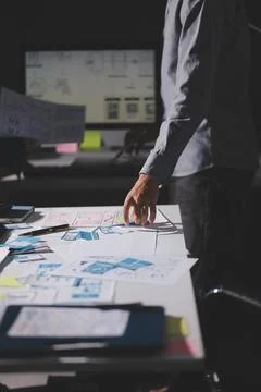 Team of Program Developer Collaborating on UXUI Design Planning in a Modern.. 写真素材