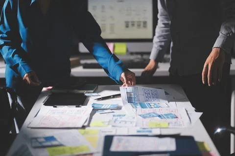 Team of Program Developer Collaborating on UXUI Design Planning in a Modern.. Stock Photos