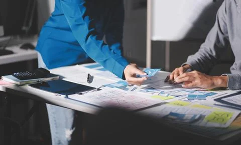 Team of Program Developer Collaborating on UXUI Design Planning in a Modern.. Stock Photos