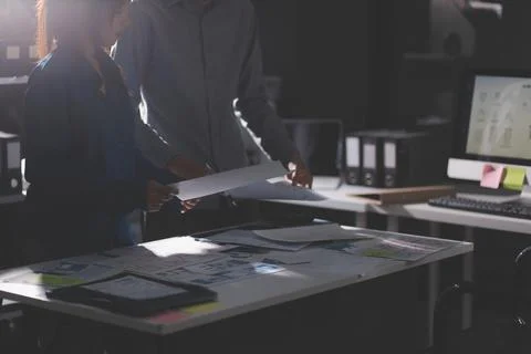 Team of Program Developer Collaborating on UXUI Design Planning in a Modern.. Stock Photos