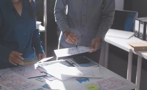 Team of Program Developer Collaborating on UXUI Design Planning in a Modern.. Stock Photos