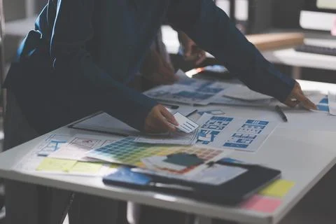 Team of Program Developer Collaborating on UXUI Design Planning in a Modern.. Stock Photos