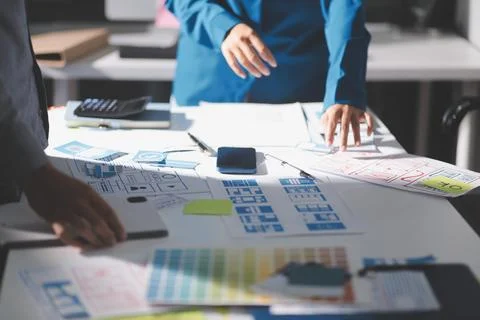 Team of Program Developer Collaborating on UXUI Design Planning in a Modern.. Stock Photos