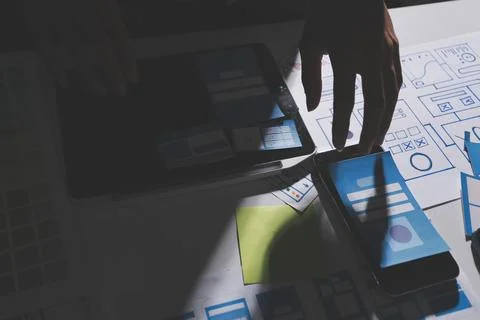 Team of Program Developer Collaborating on UXUI Design Planning in a Modern.. Stock Photos