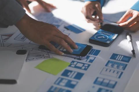 Team of Program Developer Collaborating on UXUI Design Planning in a Modern.. Stock Photos