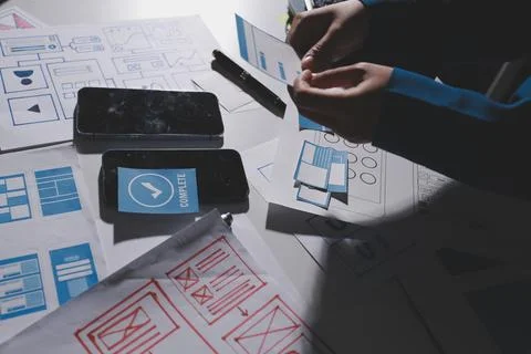 Team of Program Developer Collaborating on UXUI Design Planning in a Modern.. Stock Photos