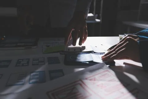 Team of Program Developer Collaborating on UXUI Design Planning in a Modern.. Stock Photos