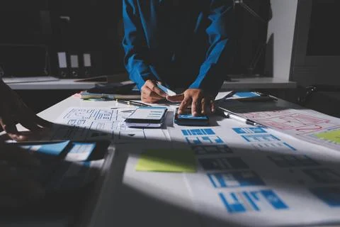 Team of Program Developer Collaborating on UXUI Design Planning in a Modern.. Stock Photos