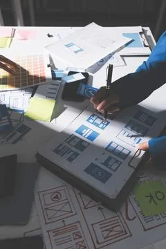 Team of Program Developer Collaborating on UXUI Design Planning in a Modern.. Stock Photos