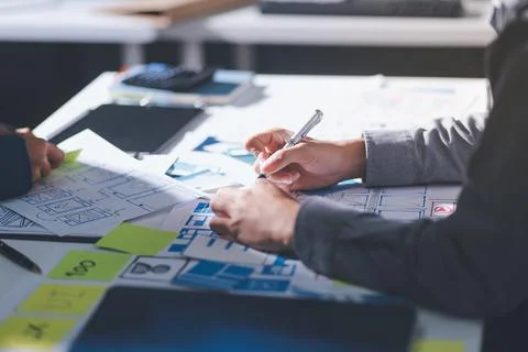 Team of Program Developer Collaborating on UXUI Design Planning in a Modern.. 写真素材