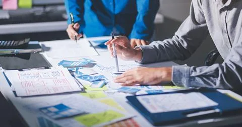 Team of Program Developer Collaborating on UXUI Design Planning in a Modern.. 写真素材