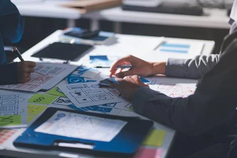 Team of Program Developer Collaborating on UXUI Design Planning in a Modern.. Stock Photos