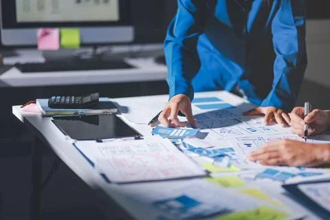 Team of Program Developer Collaborating on UXUI Design Planning in a Modern.. Stock Photos