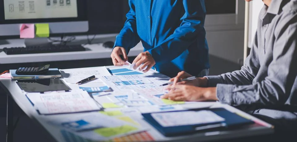 Team of Program Developer Collaborating on UXUI Design Planning in a Modern.. 写真素材