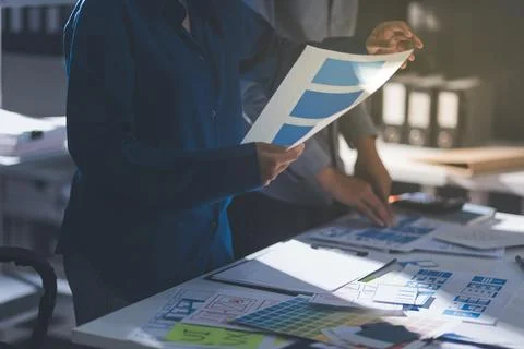 Team of Program Developer Collaborating on UXUI Design Planning in a Modern.. Stock Photos