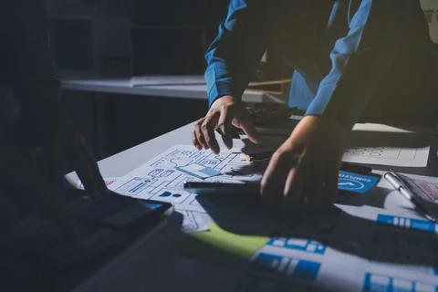 Team of Program Developer Collaborating on UXUI Design Planning in a Modern.. Stock Photos