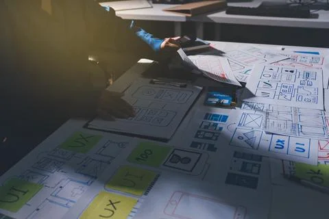 Team of Program Developer Collaborating on UXUI Design Planning in a Modern.. Stock Photos