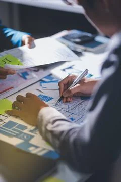 Team of Program Developer Collaborating on UXUI Design Planning in a Modern.. Stock Photos