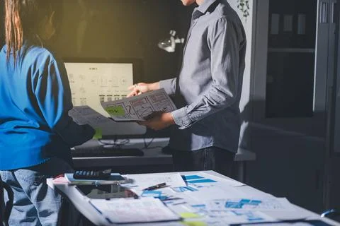 Team of Program Developer Collaborating on UXUI Design Planning in a Modern.. Stock Photos