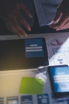Team of Program Developer Collaborating on UXUI Design Planning in a Modern.. Stock Photos