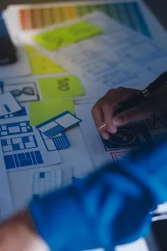 Team of Program Developer Collaborating on UXUI Design Planning in a Modern.. Stock Photos