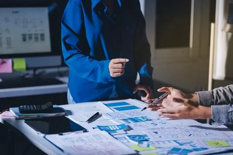 Team of Program Developer Collaborating on UXUI Design Planning in a Modern.. Stock Photos