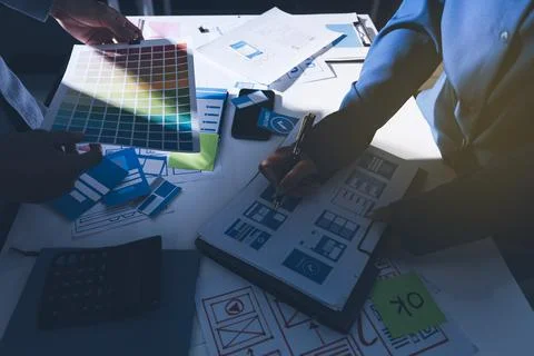 Team of Program Developer Collaborating on UXUI Design Planning in a Modern.. Stock Photos