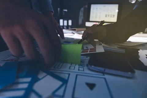 Team of Program Developer Collaborating on UXUI Design Planning in a Modern.. Stock Photos
