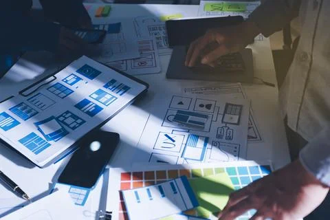 Team of Program Developer Collaborating on UXUI Design Planning in a Modern.. Stock Photos