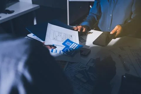 Team of Program Developer Collaborating on UXUI Design Planning in a Modern.. Stock Photos