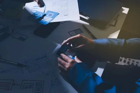 Team of Program Developer Collaborating on UXUI Design Planning in a Modern.. Stock Photos