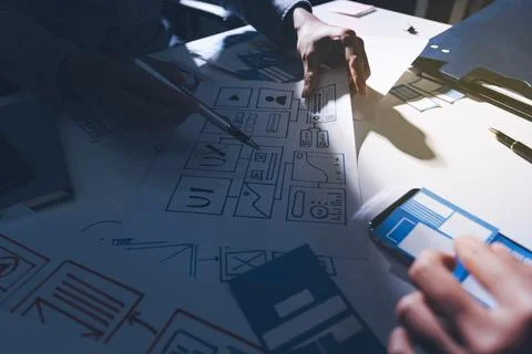 Team of Program Developer Collaborating on UXUI Design Planning in a Modern.. Stock Photos