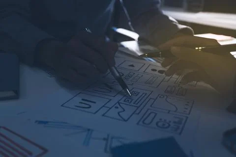 Team of Program Developer Collaborating on UXUI Design Planning in a Modern.. Stock Photos