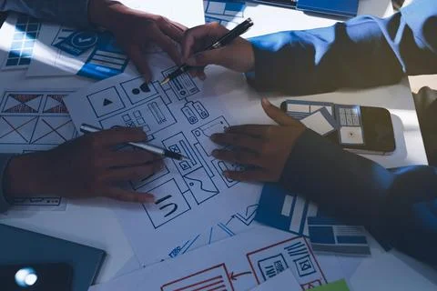 Team of Program Developer Collaborating on UXUI Design Planning in a Modern.. Stock Photos