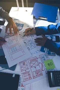 Team of Program Developer Collaborating on UXUI Design Planning in a Modern.. Stock Photos