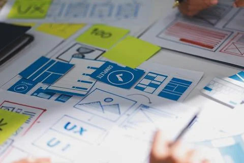 Team of Program Developer Collaborating on UXUI Design Planning in a Modern.. Stock Photos