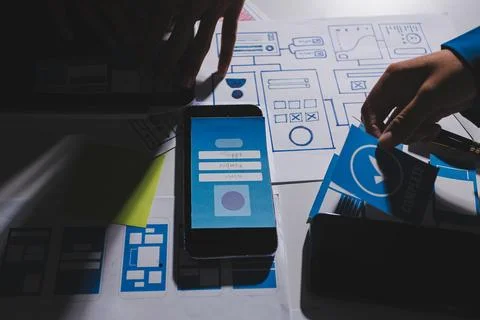 Team of Program Developer Collaborating on UXUI Design Planning in a Modern.. Foto stock