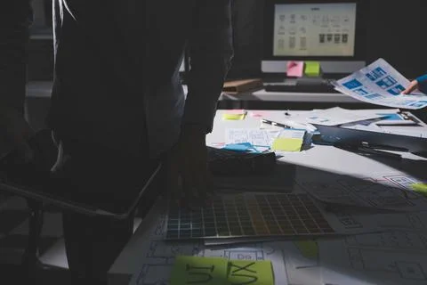 Team of Program Developer Collaborating on UXUI Design Planning in a Modern.. Stock Photos