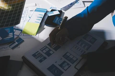 Team of Program Developer Collaborating on UXUI Design Planning in a Modern.. Stock Photos