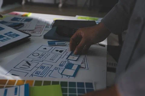 Team of Program Developer Collaborating on UXUI Design Planning in a Modern.. Stock Photos