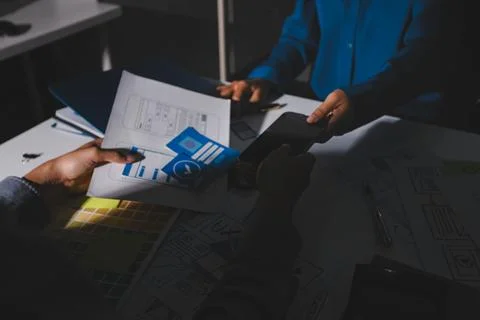 Team of Program Developer Collaborating on UXUI Design Planning in a Modern.. Stock Photos