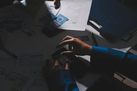 Team of Program Developer Collaborating on UXUI Design Planning in a Modern.. Stock Photos