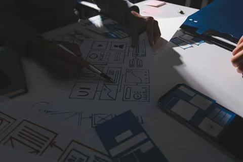 Team of Program Developer Collaborating on UXUI Design Planning in a Modern.. Foto stock