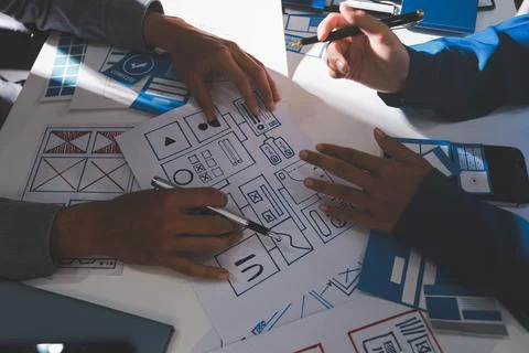 Team of Program Developer Collaborating on UXUI Design Planning in a Modern.. Stock Photos