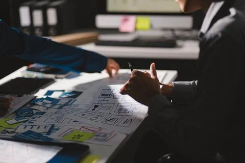 Team of Program Developer Collaborating on UXUI Design Planning in a Modern.. Stock Photos