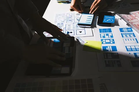 Team of Program Developer Collaborating on UXUI Design Planning in a Modern.. 写真素材