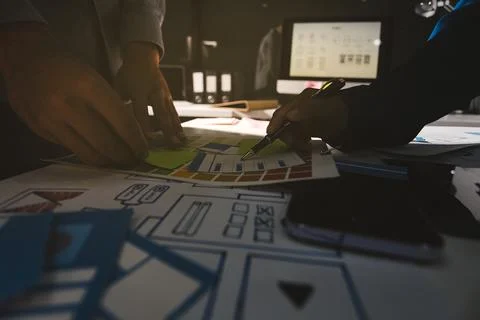 Team of Program Developer Collaborating on UXUI Design Planning in a Modern.. Stock Photos