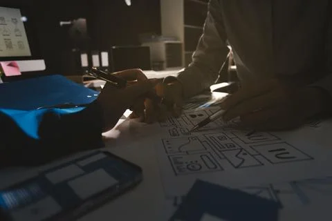 Team of Program Developer Collaborating on UXUI Design Planning in a Modern.. Stock Photos