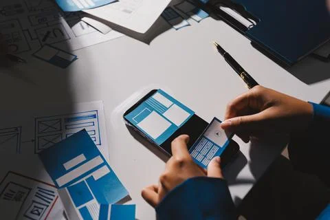 Team of Program Developer Collaborating on UXUI Design Planning in a Modern.. Stock Photos